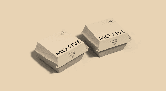 Premium clamshell burger boxes showcasing a unique combination of bold top typography and textured geometric bases.