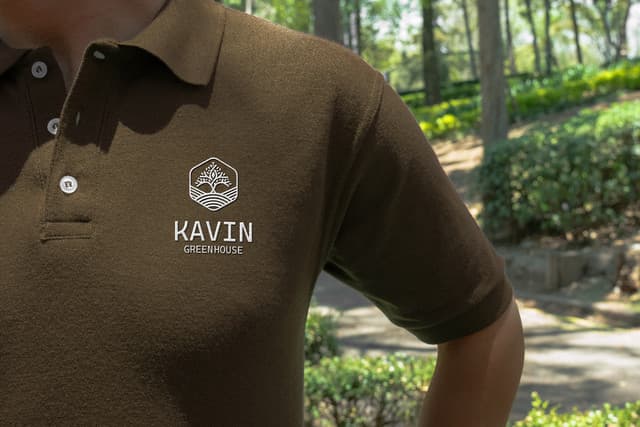 Staff polo shirt featuring white chest embroidery.
