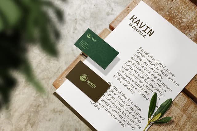 Close-up detail of the business card and brand manifesto letterhead.