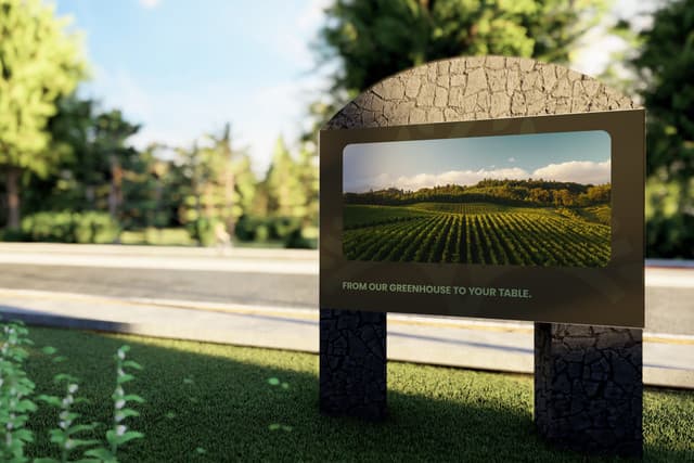 Roadside entrance signage with the "From Our Greenhouse to Your Table" messaging.