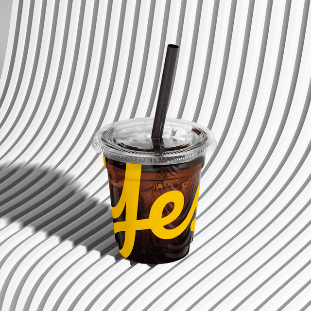 Branded cold-brew/soda cup mockup with black straw detail.